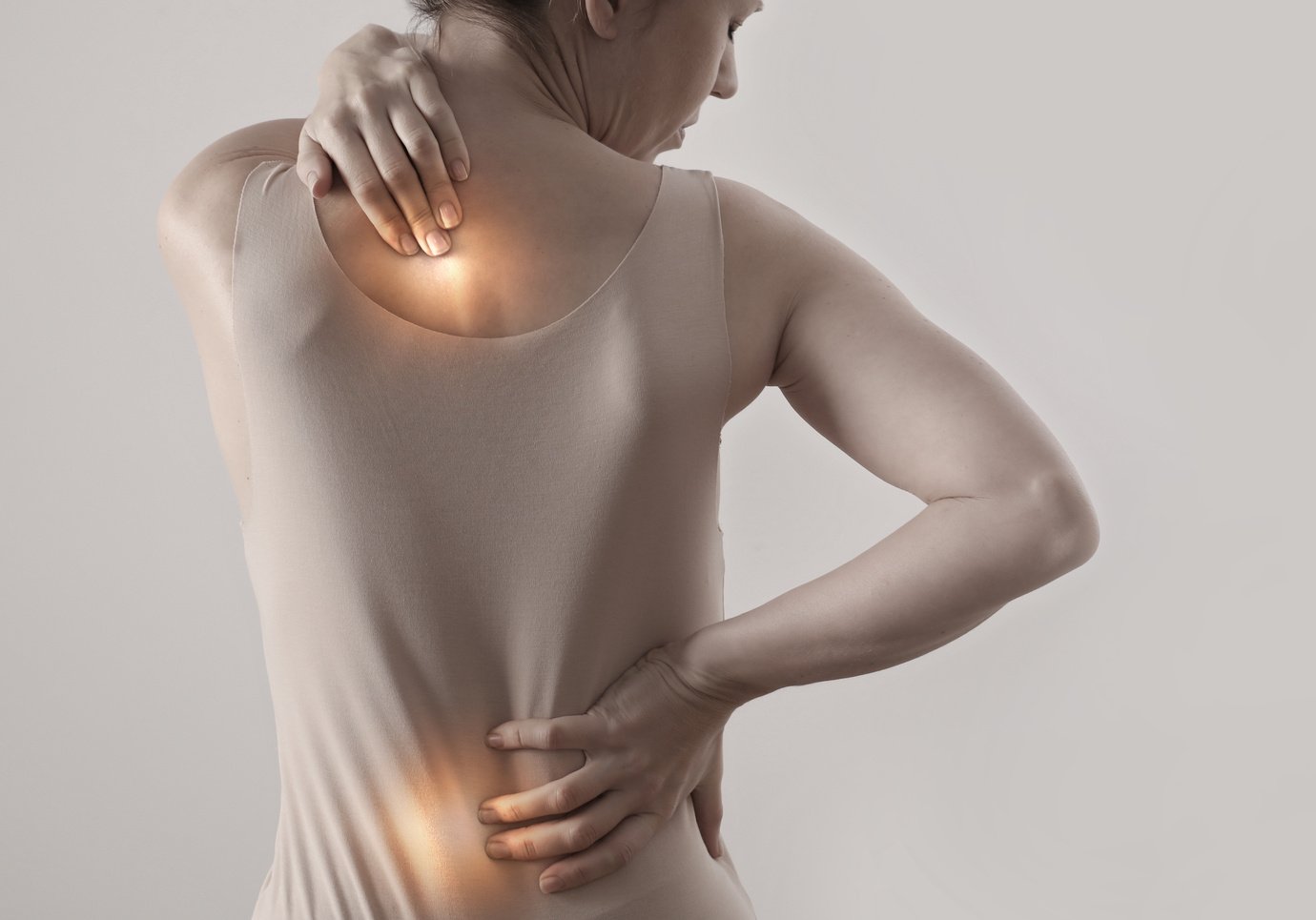 Woman suffering from back pain. Chiropractic, Physiotherapy concept